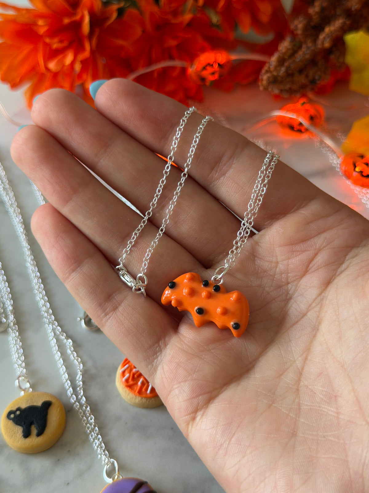 Spooky animal cracker necklace